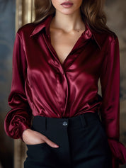 Zwarte satijnen dames blouse – elegante blouse met lange mouwen en luxueuze glans