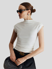 Mouwloos dames topje met hoge kraag – elegant en veelzijdig