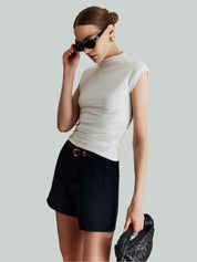 Mouwloos dames topje met hoge kraag – elegant en veelzijdig