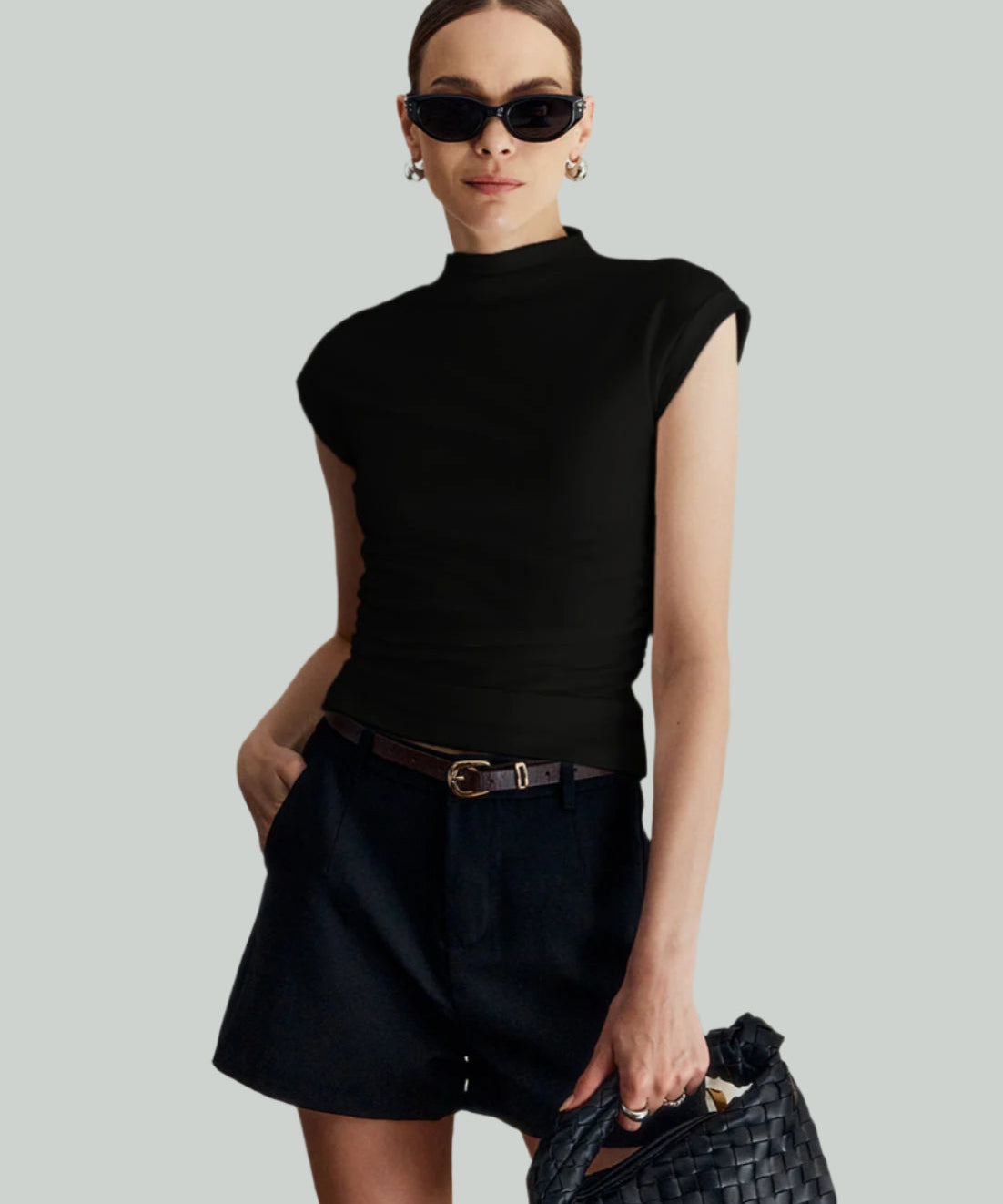 Mouwloos dames topje met hoge kraag – elegant en veelzijdig