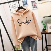 Ottelien hoodie dames – comfortabele graphic hoodie met “Smile” print