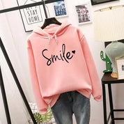 Ottelien hoodie dames – comfortabele graphic hoodie met “Smile” print