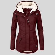 Waterdichte dames winterjas – jas met capuchon en verlengd achterpand voor extra bescherming