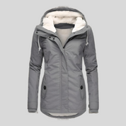 Waterdichte dames winterjas – jas met capuchon en verlengd achterpand voor extra bescherming