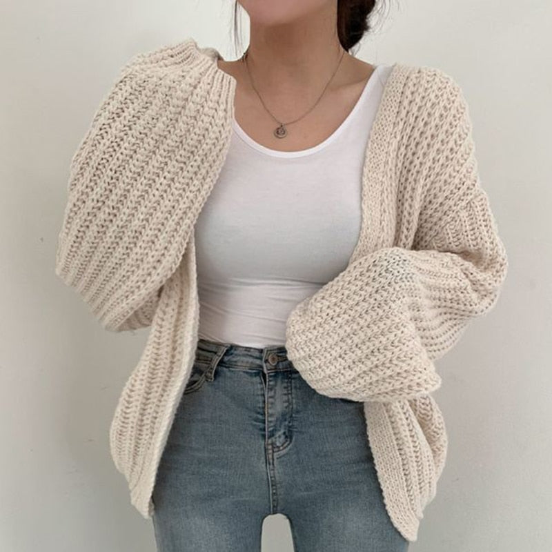 Oversized dames trui – chunky knit trui met ballonmouwen en open design