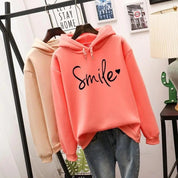 Ottelien hoodie dames – comfortabele graphic hoodie met “Smile” print